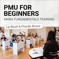 Training session for PMU beginners with participants at desks learning about lip blush and powder brows.