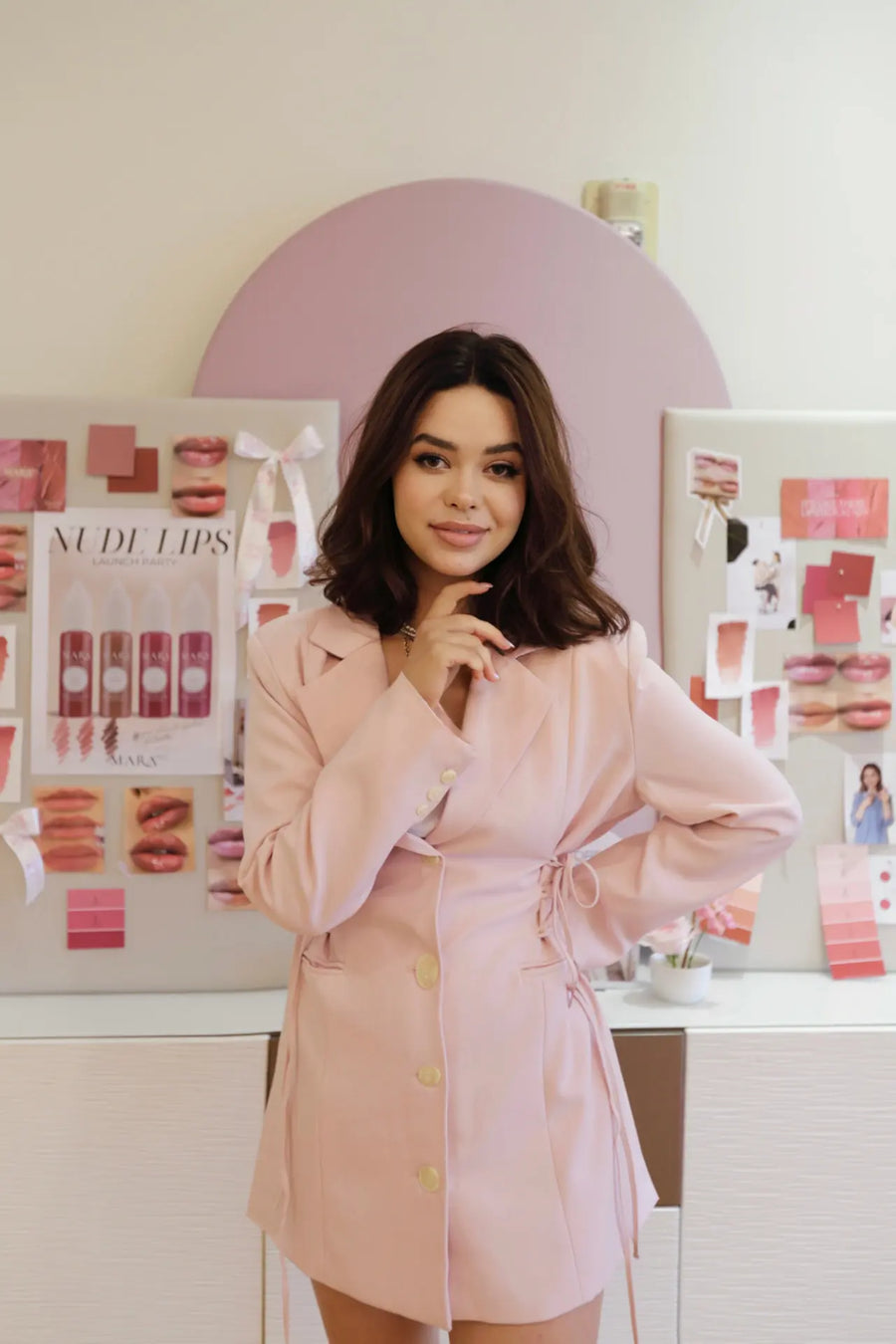 MARA PRO founder at the bench in front of a mood board of shade references